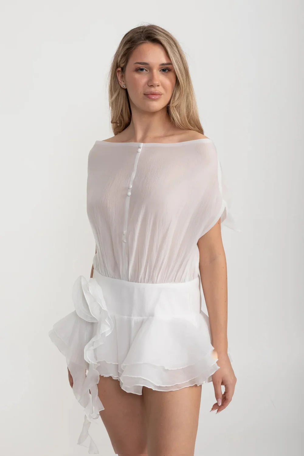 Elegant Mini Dress With Peplum Hem And Rosette Waist Embellishment - White