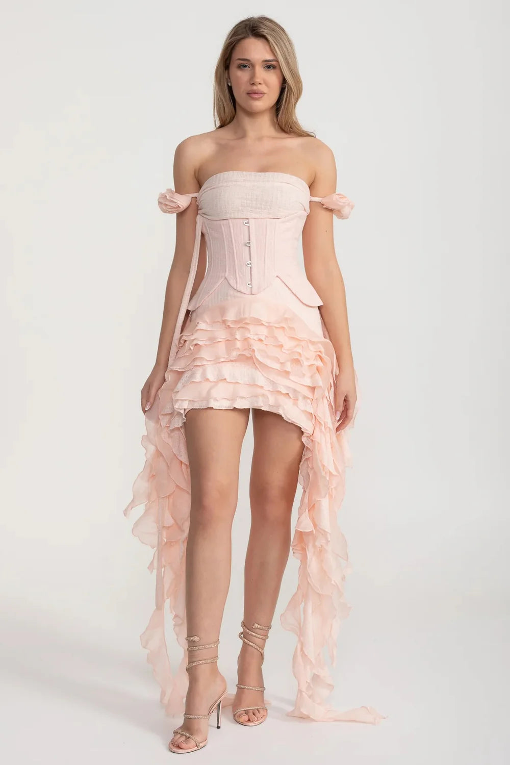 Vintage Inspired Corset Dress With Ruched Bustier And Flowing Ruffled Side Details - Pink